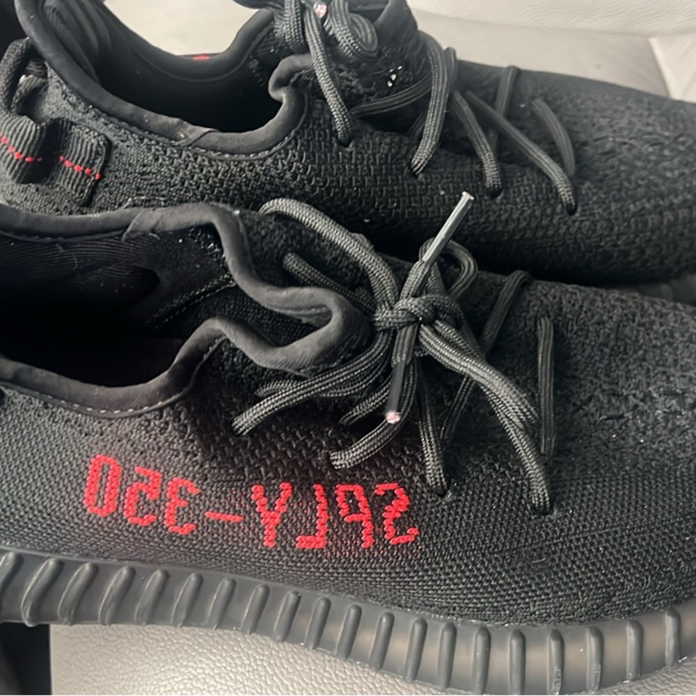 Original Use Black Athletic Shoes with Red Accents